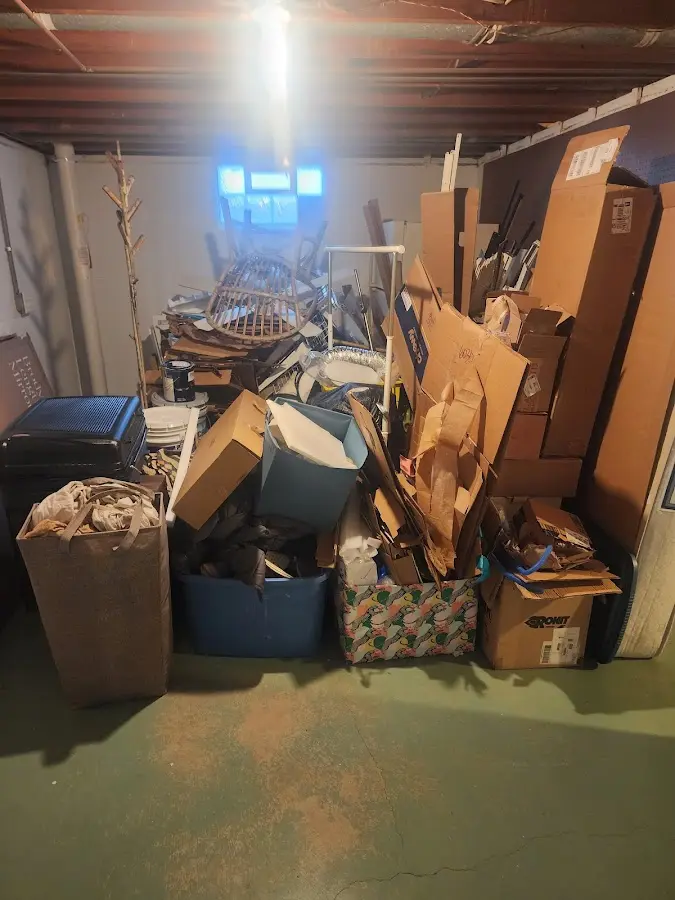 Roll-off dumpster container at job site for Roll Off Dumpster Rental in Mineola